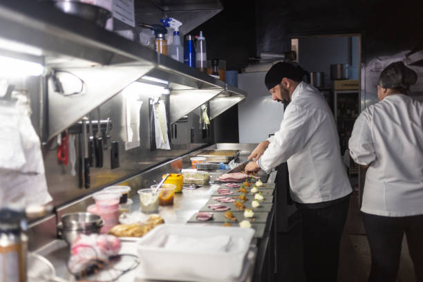 istock Food preparation station in restaurant kitchen 1463987534