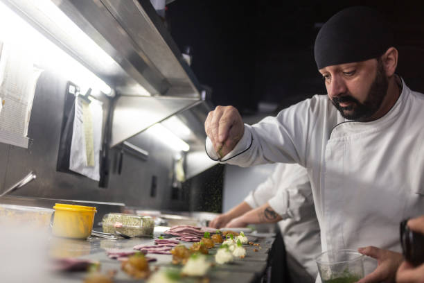 istock Portrait of culinary chef preparing dishes in kitchen 1463987538