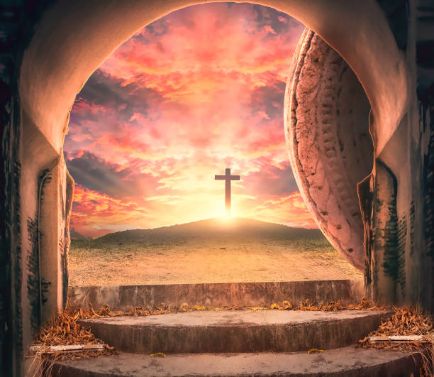 istock Easter concept: Empty tomb stone with three cross on meadow autumn sunrise background 1463995347