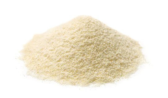 Pile of semolina flour isolated on white
