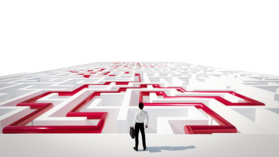 3D Rendering. 3D Businessman Standing in front of the maze. Success soncept.