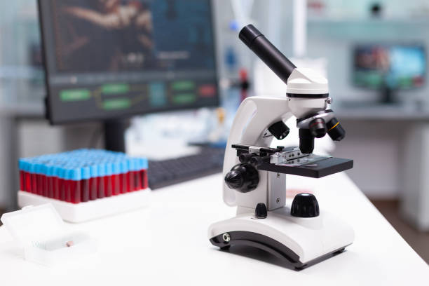 istock Dna molecular sample under microscope ready for biological virus vaccine investigation 1464004649