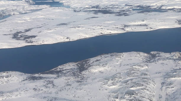 istock View from plane window over snow covered, Tromso, Norway 1464006612