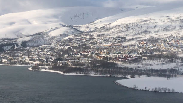 istock View from plane window over snow covered, Tromso, Norway 1464006763