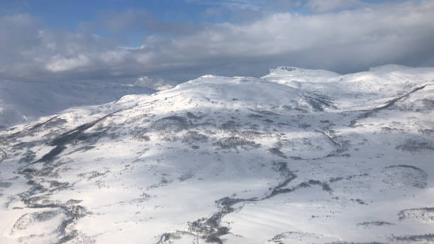 istock View from plane window over snow covered, Tromso, Norway 1464006768
