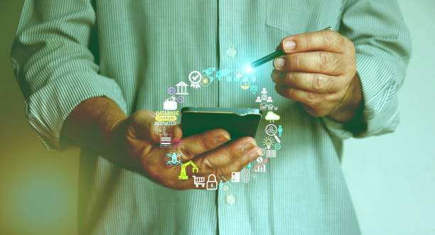 istock man using stylus pen with smart phone choose business element futuristic digital icon for on line working 1464016384
