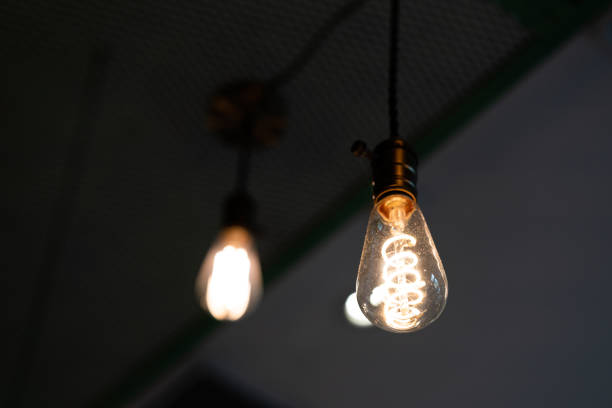 istock Ceiling light bulbs. vintage lamp, bulb decorative in home 1464017758