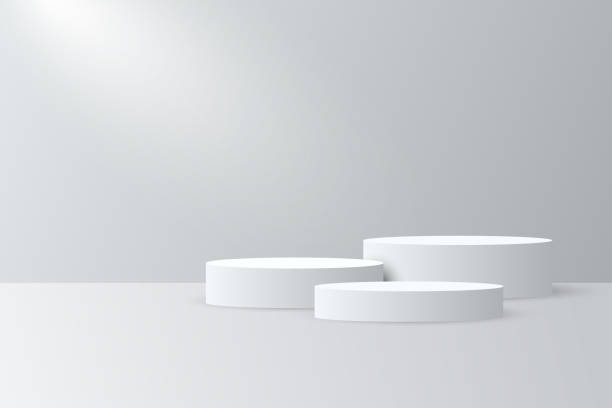 istock Abstract white 3D room with realistic white cylinder pedestal podium set.
Minimal scene for product display presentation. Vector geometric platform. Stage for showcase. 1464019151