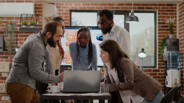 istock Team of colleagues brainstorming ideas to plan project 1464020895