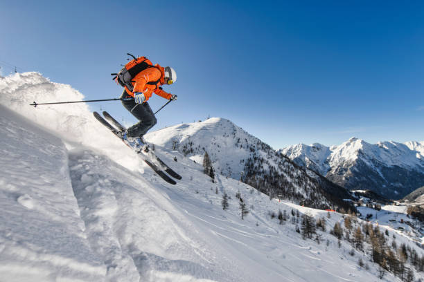 istock Off-piste skier near a ski area 1464023107