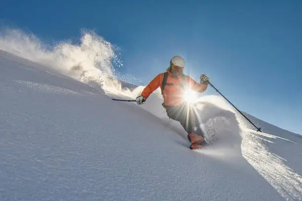 Free-ride on a sunny day on the Italian alps