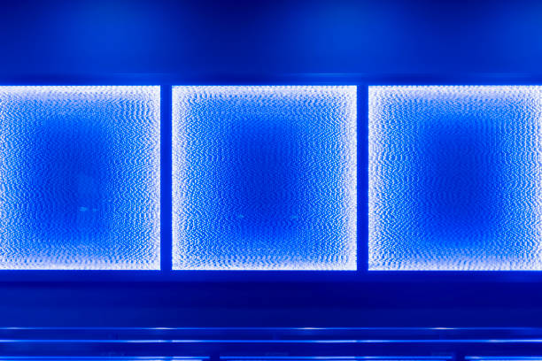 The texture of the wall is illuminated by blue lights