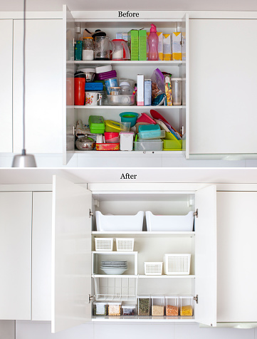 Storage ideas in the kitchen. White box and basket. Shelf order system. Modern interior.