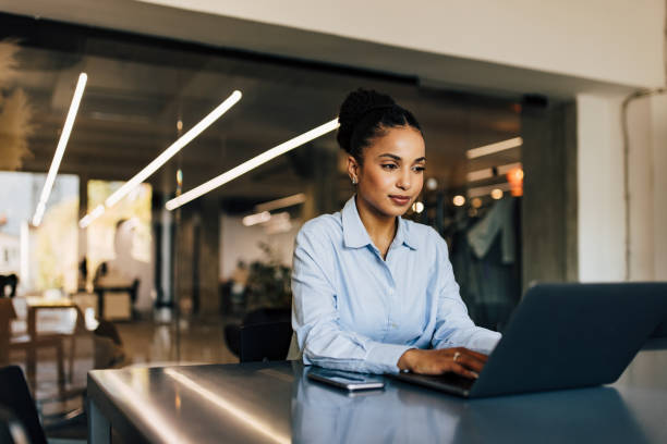 istock An African Businesswoman is working on a new project using a laptop, elegantly dressed. 1464029189