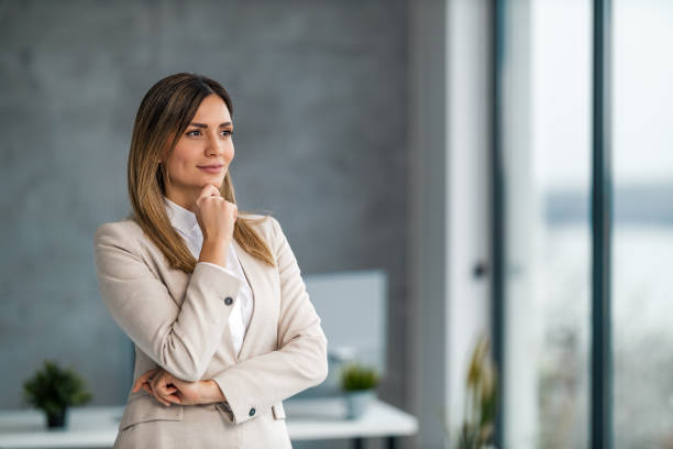 istock Beautiful young businesswoman posing in office 1464031370