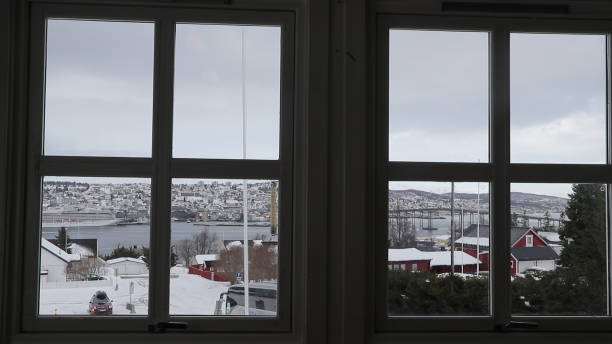istock View of Tromso port through the window 1464031815