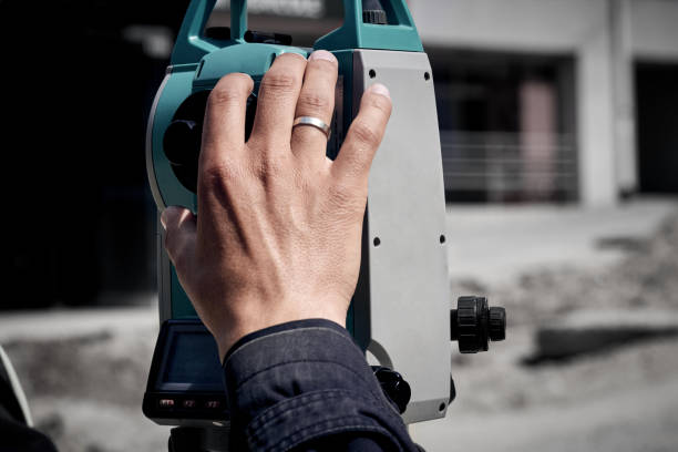 istock Theodolite instrument for measuring land angles during construction. 1464033053