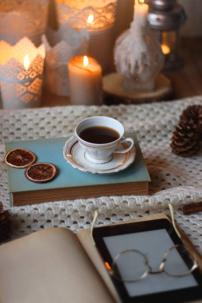 istock Tea, Books, Tablet, Cookies and Candles 1464033277