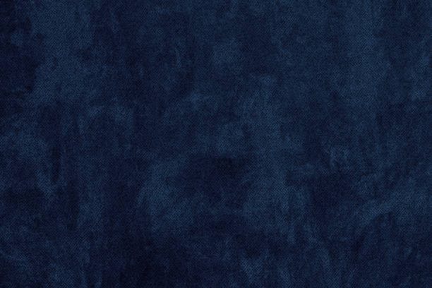 istock Navy blue color textured surface. Dark textile texture. Indigo colour abstract grunge background 1464035330