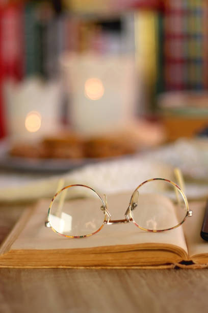 istock Tea, Books, Tablet, Cookies and Candles 1464038965