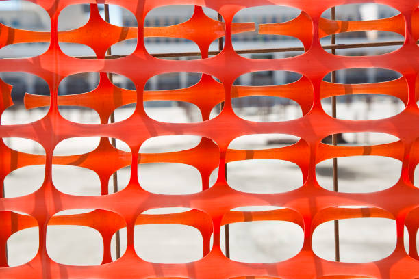 Plastic safety grid in construction site areas to delimit construction activities