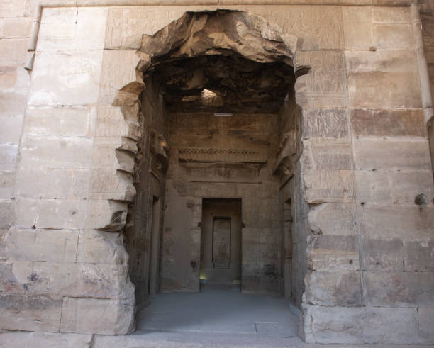 istock Ancient egyptian temple entrance door with hieroglyphics 1464050138
