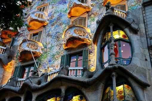 Barcelona, Spain – June 05, 2018: A closeup shot of the colorful balconies of Casa Batllo  in Barcelona in the evening