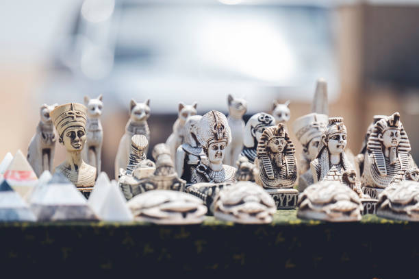 istock Closeup shot of pharaoh figurines on a blurred background 1464054388