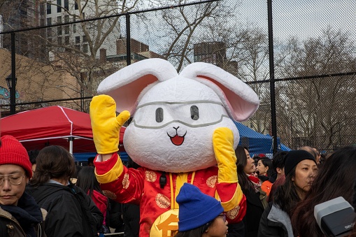 New York, United States – January 22, 2023: A person wearing a rabbit costume during the  Chinese New Year Firecracker Ceremony