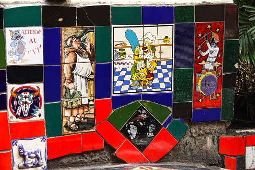 Rio de Janeiro, Brazil – February 11, 2018: A closeup shot of mosaic tiles of famous characters at Escadaria Selaron in Rio de Janeiro, Brazil