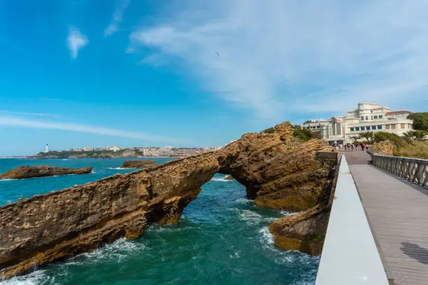 Photo of Beautiful Plage du Port Vieux touristic beach with wooden bridg in Biarritz municipality, France