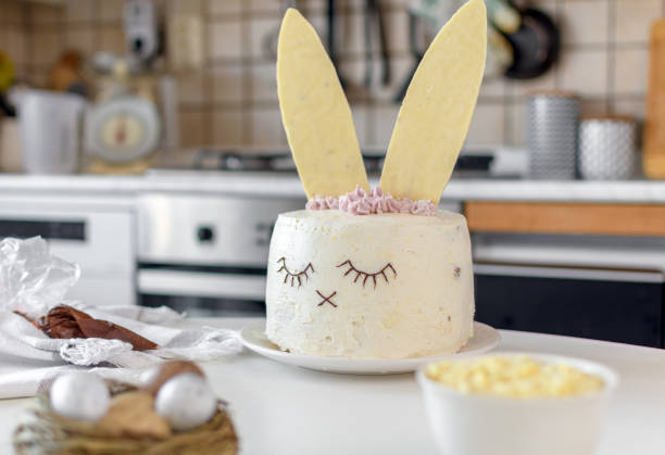istock Amazing cake decorated as bunny on table in kitchen. 1464071301