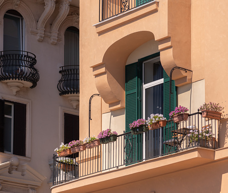 Italian balcony with flowers in the city of Naples in Italy