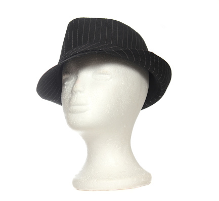 A closeup shot of a Classic Fedora hat on a mannequin head