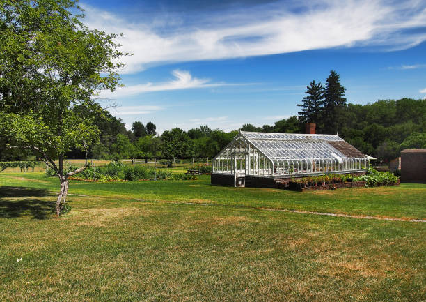 istock landscape with greenhouse 1464081268