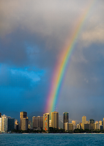 Captured from a boat, this is Hilton Rainbow Tower on their Oahu Grand Resort. I was able to get the rainbow to line up with the tower.
