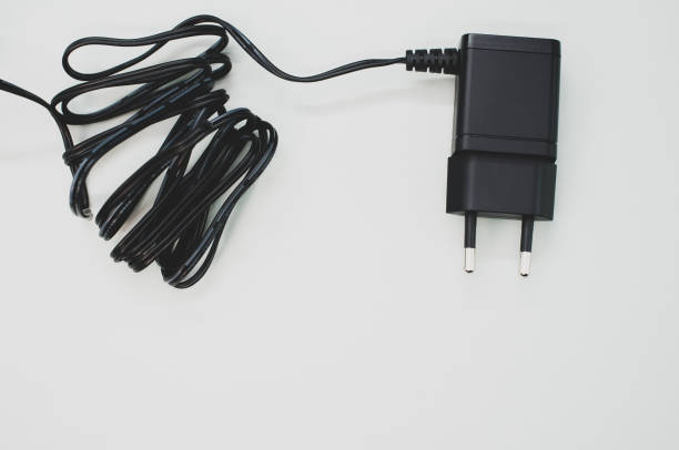 istock Top view of wired charger adapter isolated on white background 1464082767