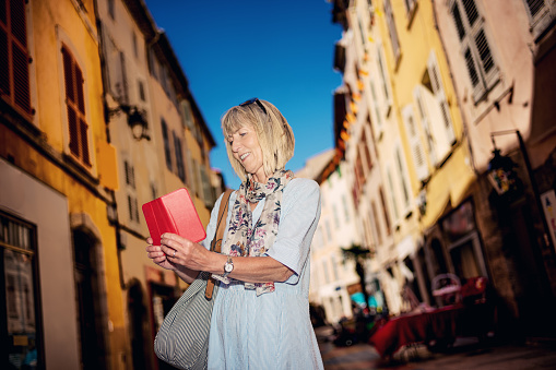 Woman exploring the town of Draguignan in the Provence region of France.