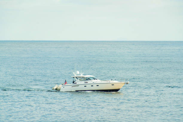 istock Speedboat sailing on a calm sea under a clear sky at summertime 1464091474