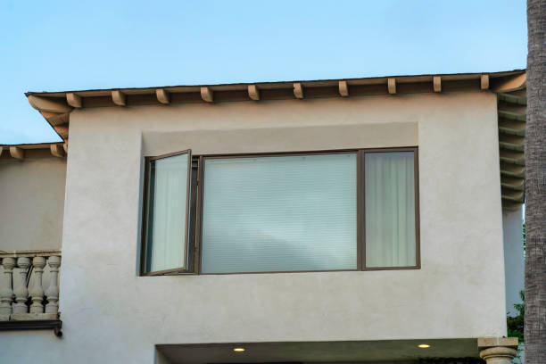 istock Facade of a house under a blue clear sky 1464091518