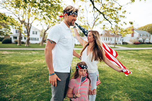 pride family with usa flag