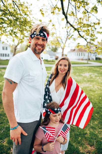istock pride family with usa flag 1464107596