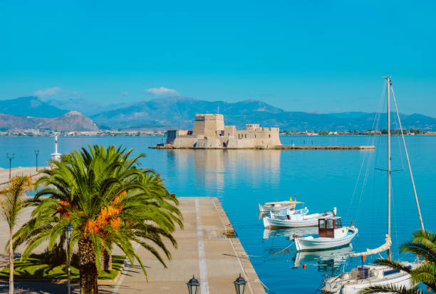 Napflio, Greece - September 3, 2022: A view of the port of Napflio and Bourtzi castle in the Aegean sea, in Greece