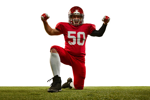 Football Player on red uniform isolated on white background