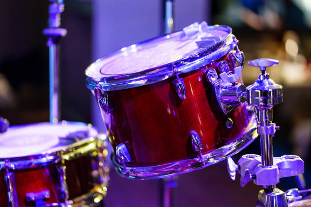 istock drum kit. set of drums, cymbals and other percussion instruments on stage 1464113452
