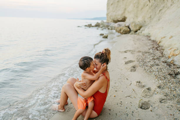 istock Mother and son moments at the beach 1464118450