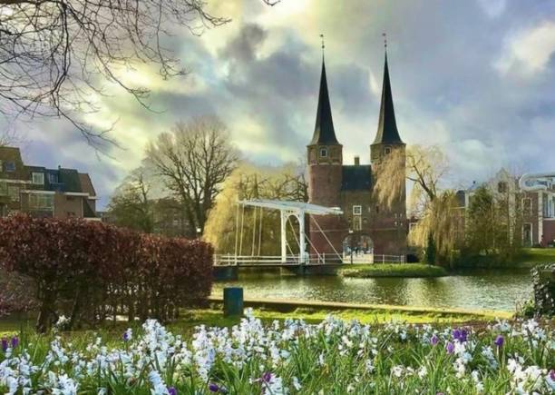 Eastern gate in Delft, The Netherlands in a spring  sunny day with flowers blooming.