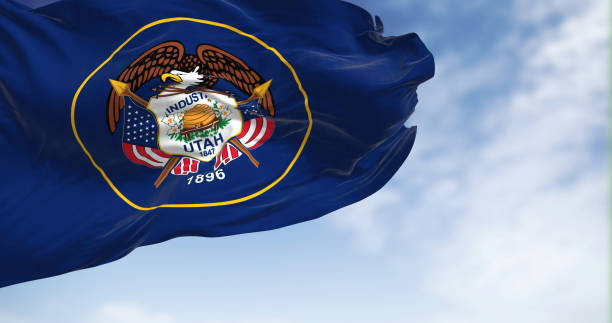 istock The Utah state flag fluttering in the wind on a sunny day 1464119086