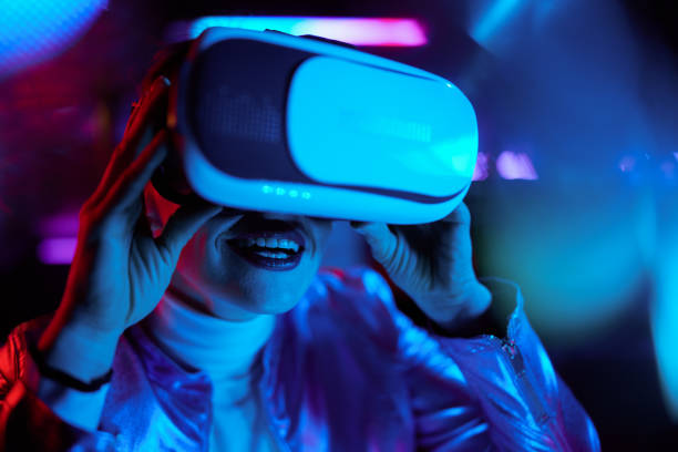 istock smiling modern 40 years old woman testing out virtual reality 1464121195