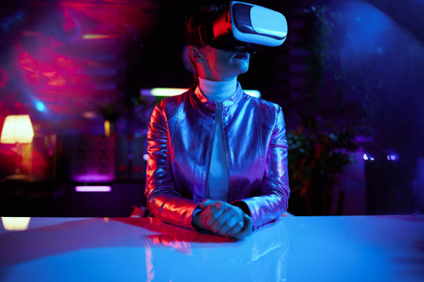 istock modern woman in vr headset in modern office 1464121235